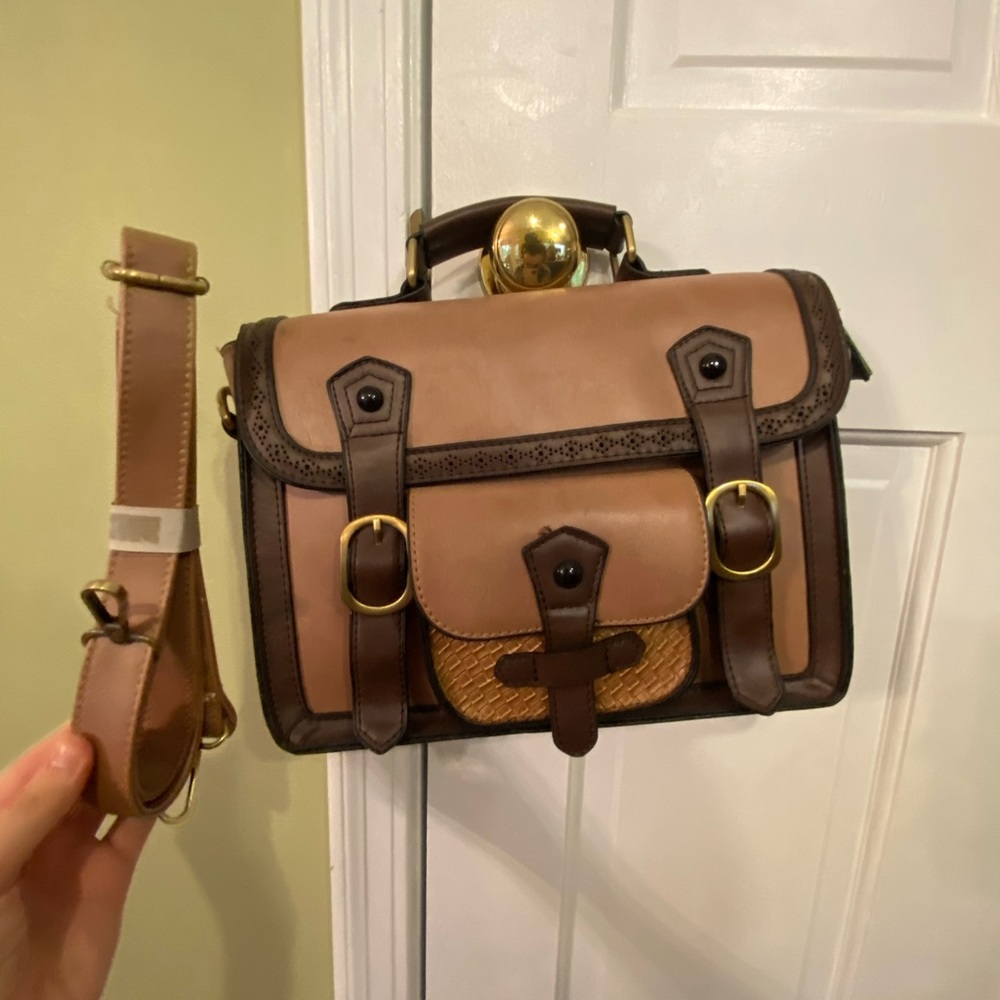 Brand new altar’d state purse. Shoulder strap included.